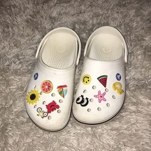 White crocs with charms